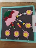 Jucărie educativă din material textil pentru învățarea numerelor și dezvoltarea motricității fine. Ideale pentru copii și activități de învățare.