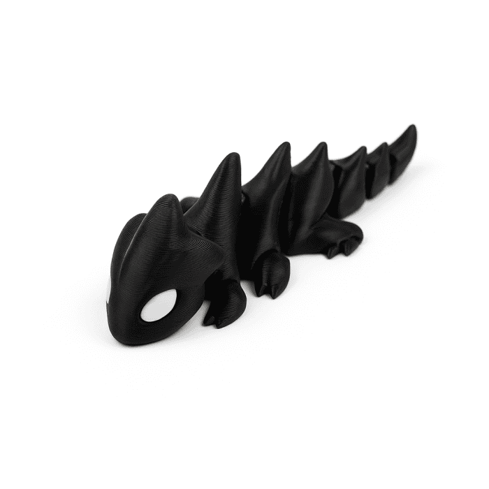Silnic de jucărie din cauciuc în forma de dragon negru, pentru jocuri și activități creative.